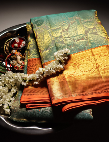 Mangai Glow β Light Green & Orange Handloom Pure Silk Bridal Saree