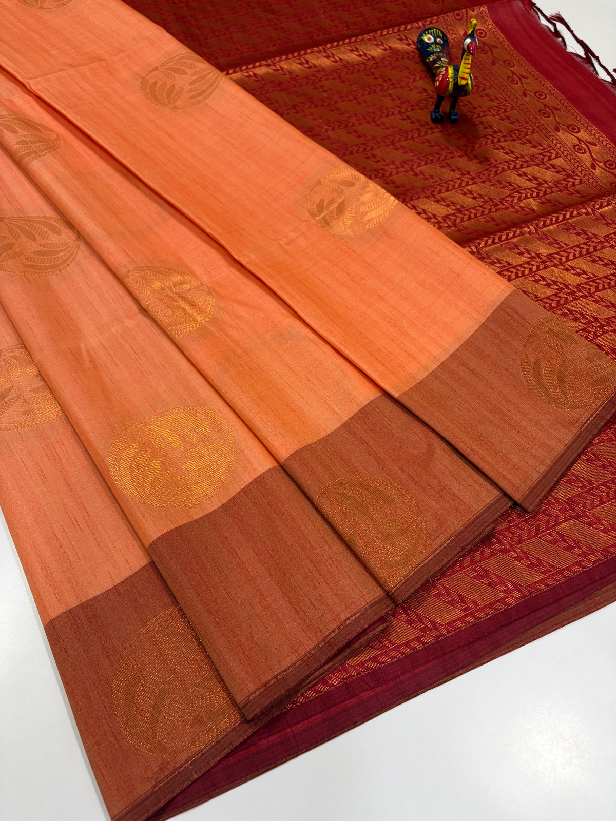 Peachy Coral Orange with Rust Brown Border & Deep Maroon Pallu – Handloom Semi Raw Softsilk Saree