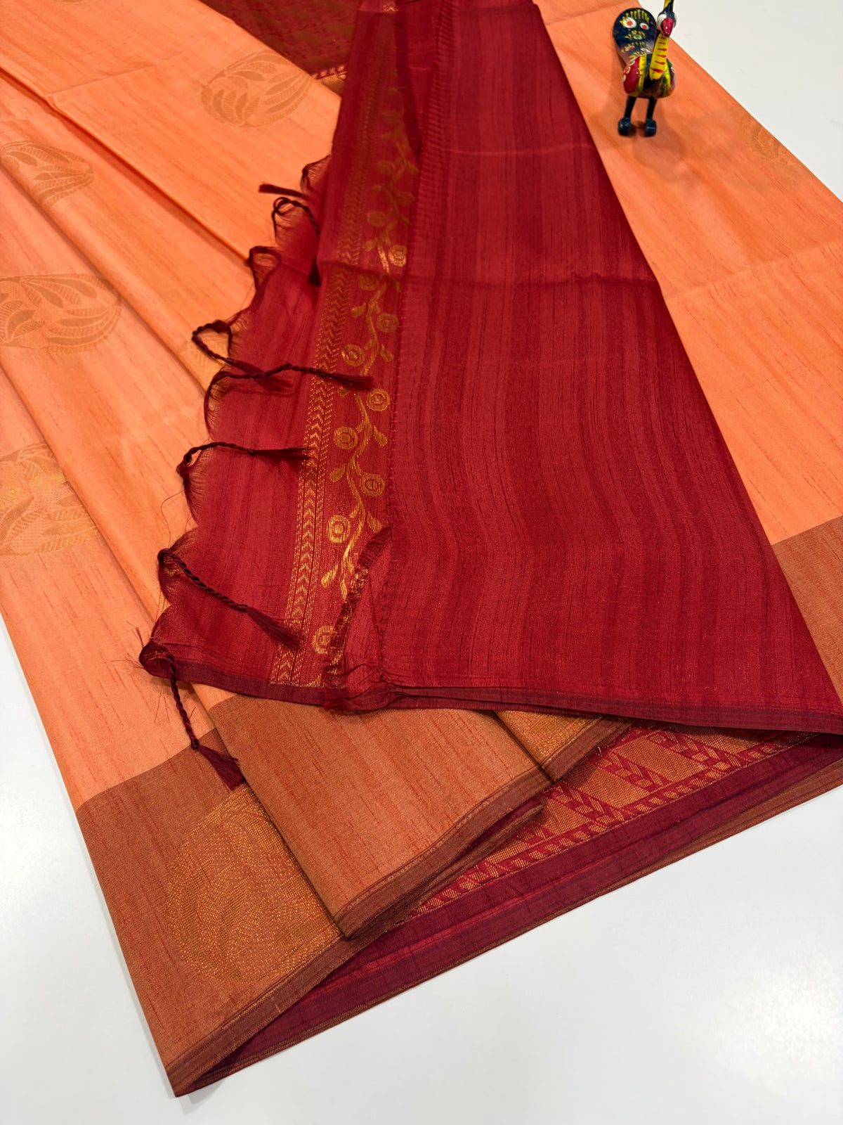 Peachy Coral Orange with Rust Brown Border & Deep Maroon Pallu – Handloom Semi Raw Softsilk Saree
