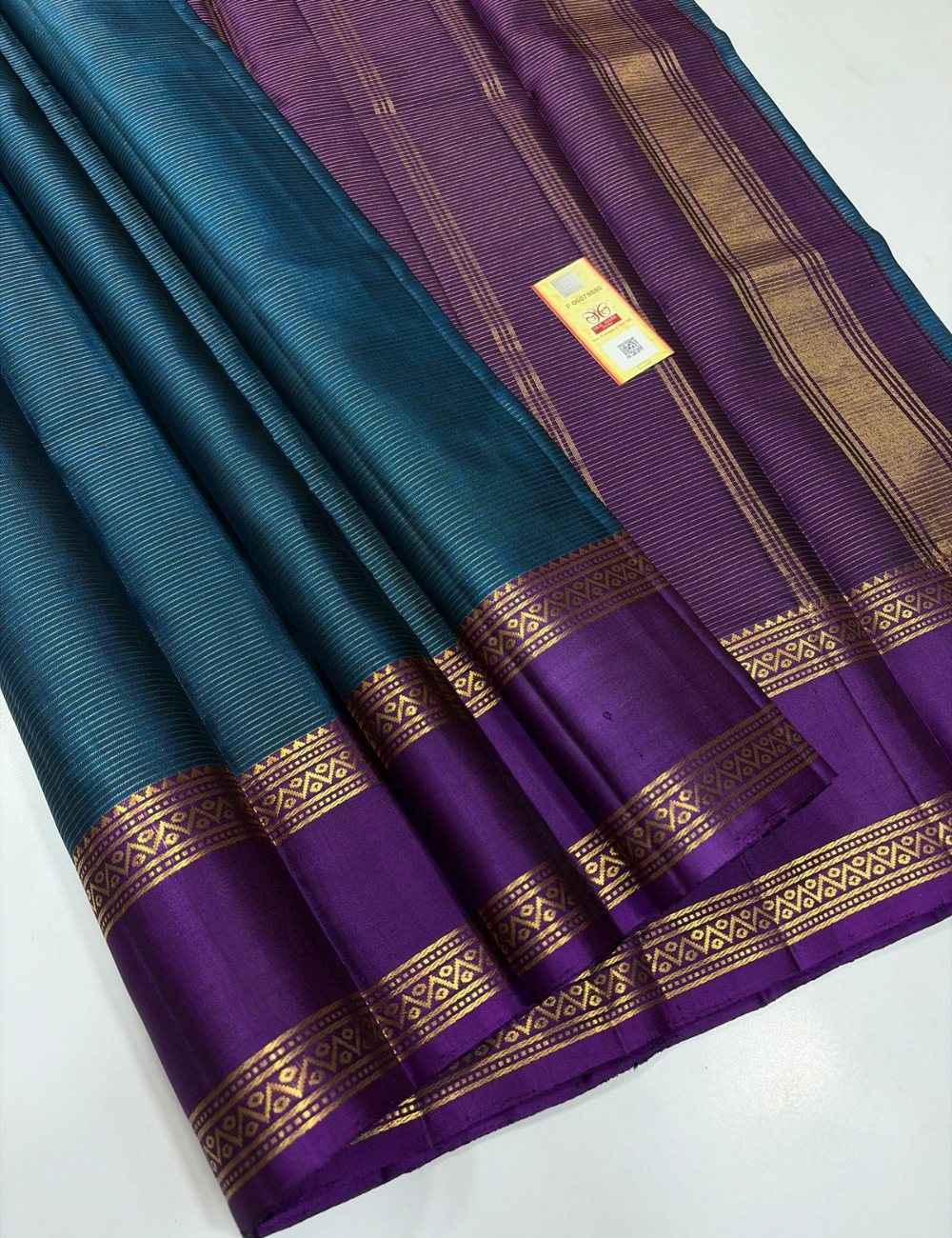 Teal Peacock Blue Handloom Silk Saree with Eggplant Purple Vairaoosi Lines & Rettapet Contrast Border