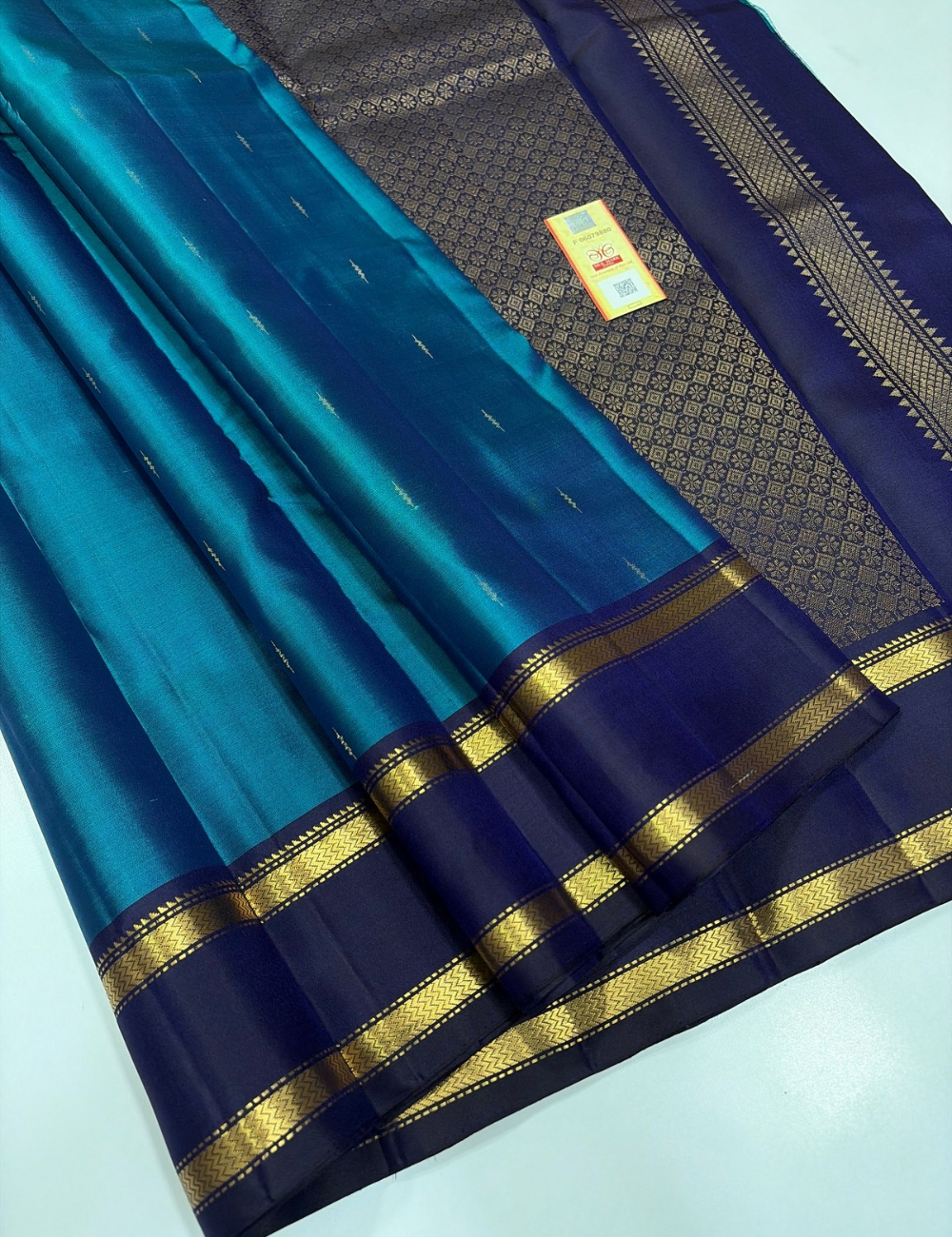 Peacock Blue Silk Saree with Navy Blue Rettapet Kanchi Contrast Border