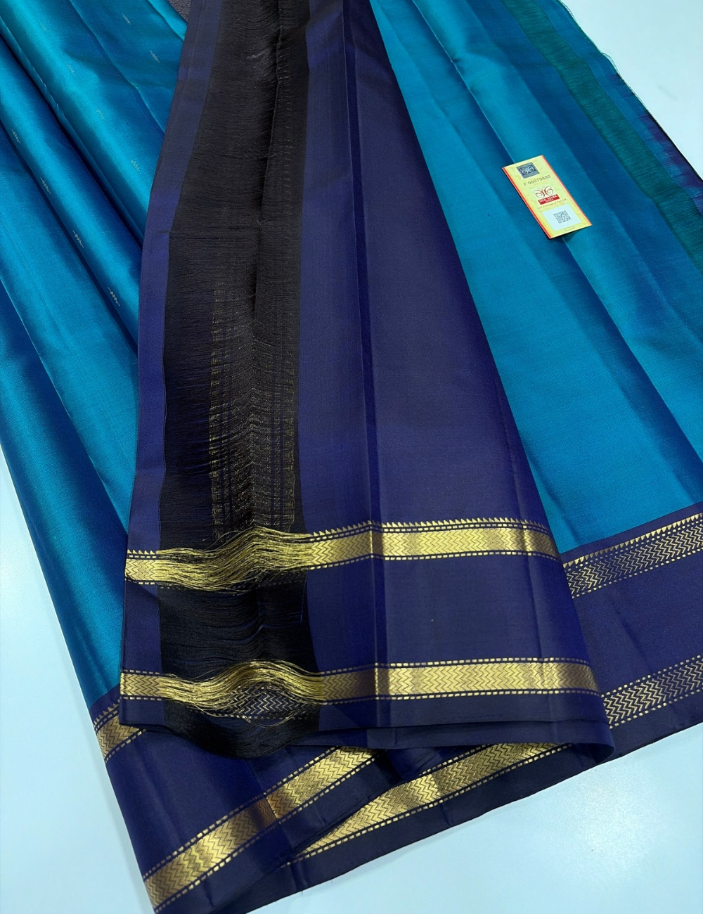 Peacock Blue Silk Saree with Navy Blue Rettapet Kanchi Contrast Border
