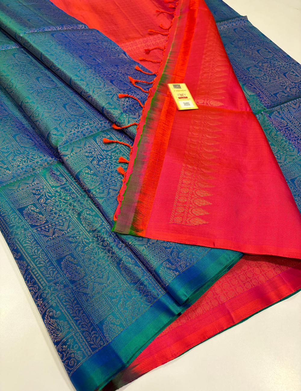 Dual Tone Teal Blue & Peacock Blue Full Brocade Soft Silk Saree with Orangish Pink Pallu