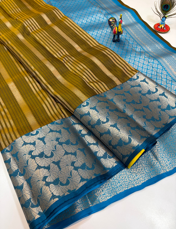 50% Pure Mix Silk Saree – Olive Mustard with Peacock Blue Contrast Pallu & Antique Gold Brocade Border | Emboss Design Body