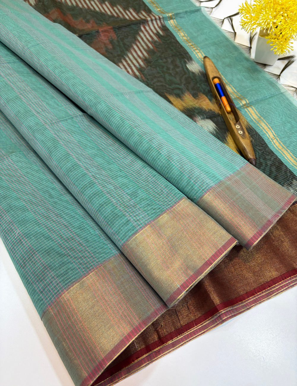 Semi Silk Cotton Ikat Design Tissue Border Saree – Aqua Green with Gold Tissue Border