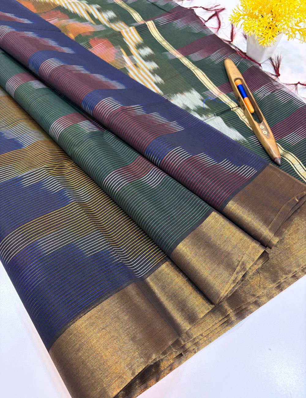 Semi Silk Cotton Ikat Design Tissue Border Saree – Navy Blue with Gold Tissue Border