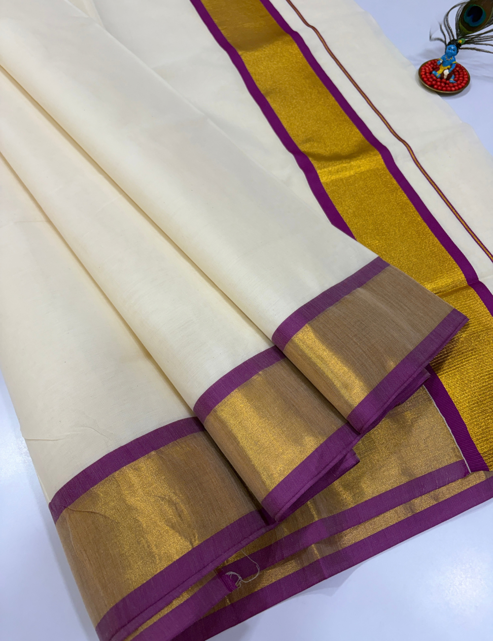 Elegant White Cotton Saree with Contrast Violet Tissue Border