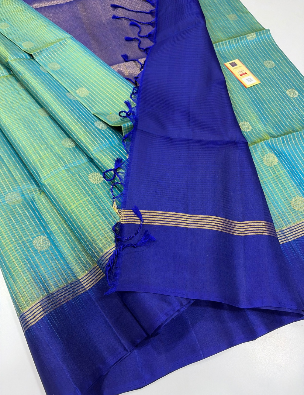 Sea Green Handloom Pure Soft Silk Saree with Raindrop Weaves & Royal Blue Tie and Dye Contrast Border | Silk Mark Certified